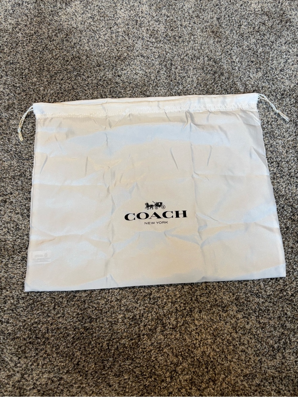 COACH dust Bag in white with black logo
